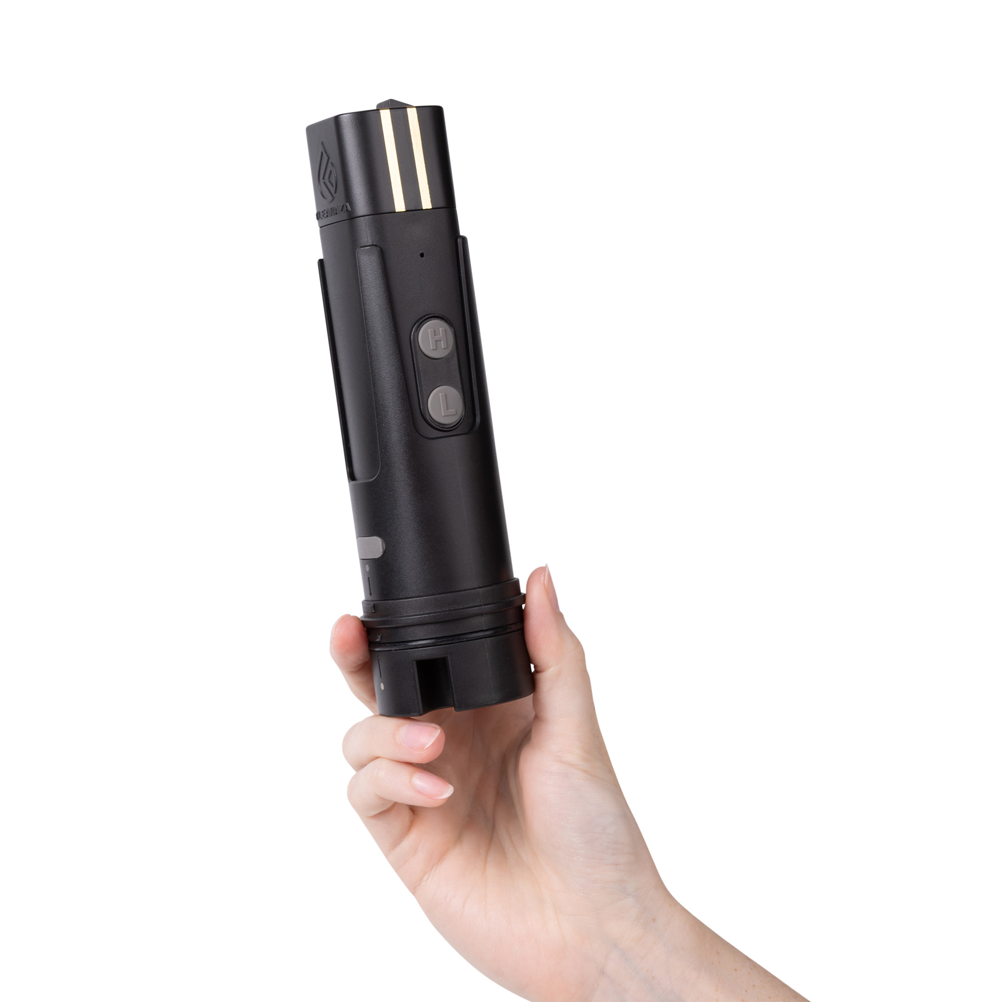 Kleanaza portable bidet held in one hand with the nozzle stowed
